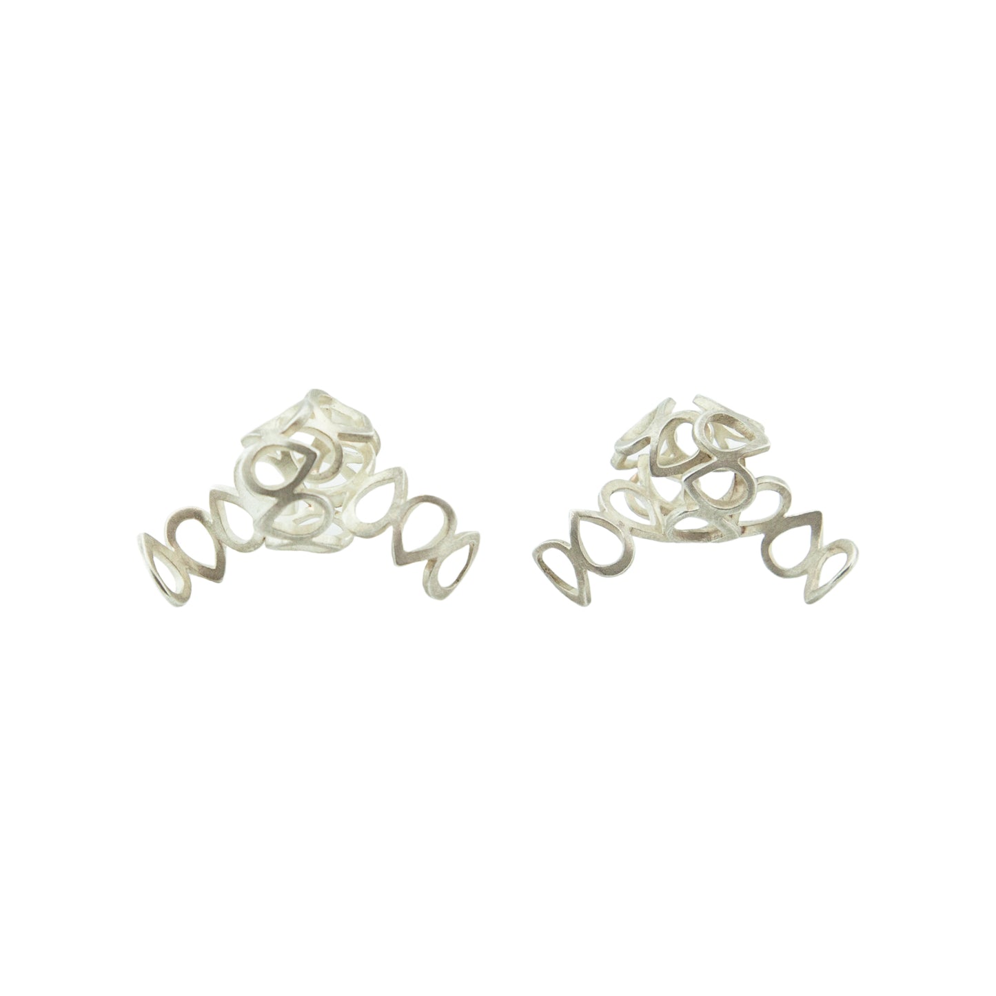 One-of-a-kind knotted lace earrings, cut out and formed by hand, in sterling silver. Size: 30mm wide Style: Button Metal: Sterling Silver Handmade by Meg C