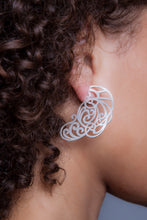 Intricate, hand-cut lace earrings in sterling silver, with 14k white gold posts.   Size: 45mm long Style: Drop Metal: 14k White Gold Post; Sterling Silver Handmade by Meg C