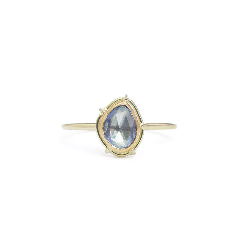 One-of-a-kind, pear shaped rose cut blue sapphire in a signature setting, on a shouldered lightweight band. Size: 5.75 (can be resized) Stone: 0.64ct Rose Cut Sapphire Metal: 18k Yellow Gold and 22k Yellow Gold Handmade by Tura Sugden