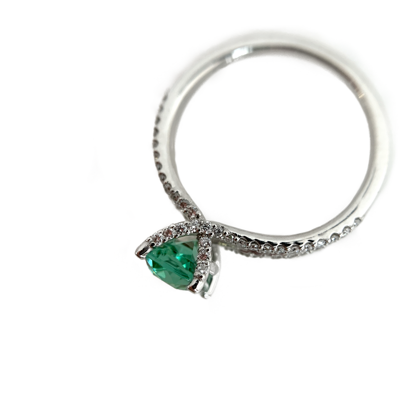 Featuring a glowing, cushion cut, blue-green tourmaline set in a trellis style setting with bead set diamonds flowing from the top of the prongs down the shank. Ring Size: 8 (Can be resized for free, just ask!) Stone: 1.46ct Natural Blue-Green Tourmaline; 0.32ctw Diamonds, G-H, VS Metal: 14k White Gold Handmade by Meg C
