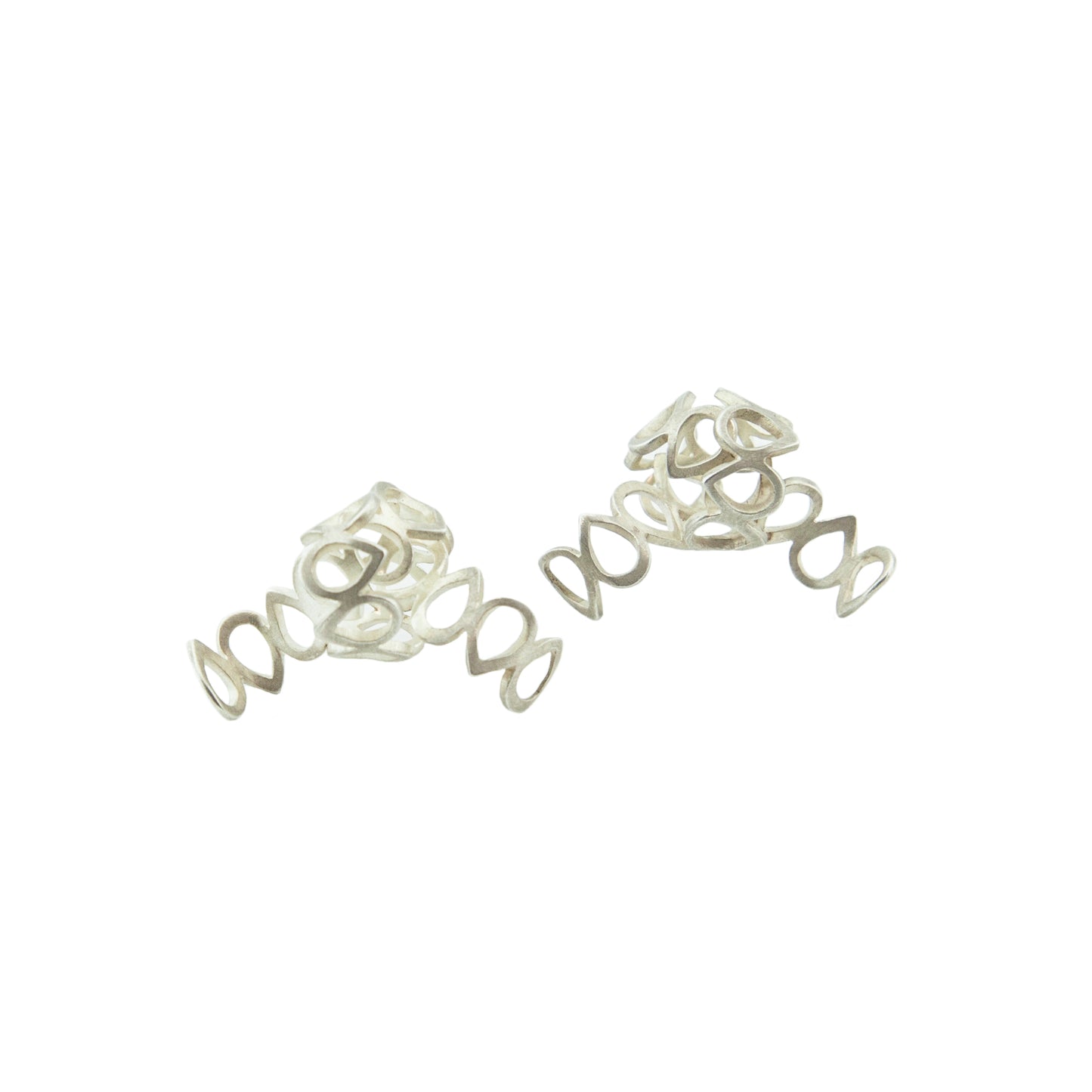  One-of-a-kind knotted lace earrings, cut out and formed by hand, in sterling silver.   Size: 30mm wide Style: Button Metal: Sterling Silver Handmade by Meg C