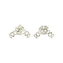  One-of-a-kind knotted lace earrings, cut out and formed by hand, in sterling silver.   Size: 30mm wide Style: Button Metal: Sterling Silver Handmade by Meg C
