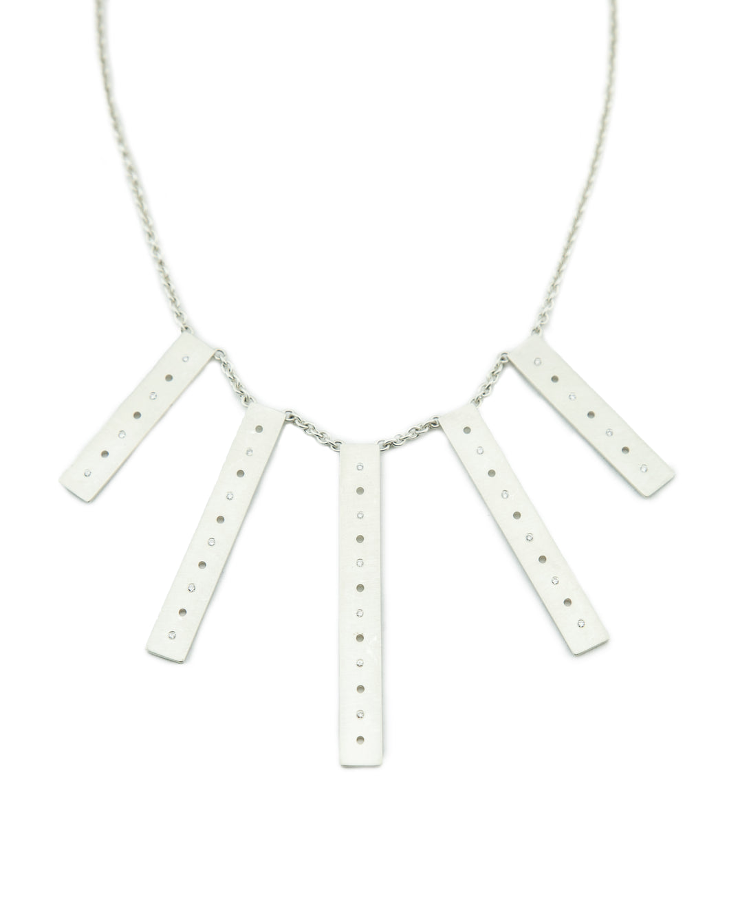 Clean and sleek, sterling silver and diamond bar statement necklace.   Size: Bars vary from 40mm-60mm long; 8mm width; 18