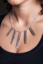 Clean and sleek, sterling silver and diamond bar statement necklace.   Size: Bars vary from 40mm-60mm long; 8mm width; 18" Sterling Silver Chain Stones: 24 0.48 ctw diamonds  Metal: Sterling Silver  Handmade by Meg C
