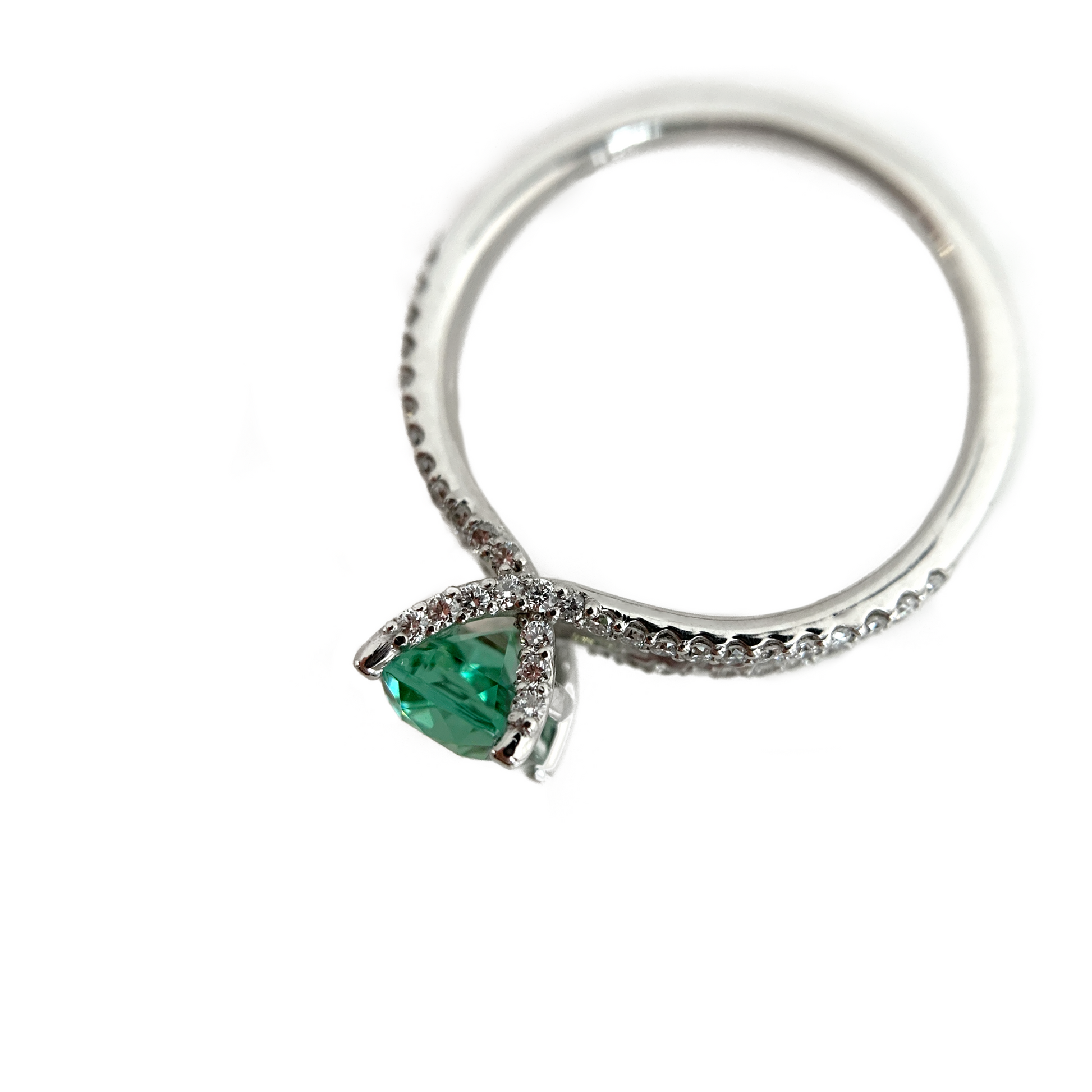 Featuring a glowing, cushion cut, blue-green tourmaline set in a trellis style setting with bead set diamonds flowing from the top of the prongs down the shank.  Ring Size: 8 (Can be resized for free, just ask!) Stone: 1.46ct Natural Blue-Green Tourmaline; 0.32ctw Diamonds, G-H, VS Metal: 14k White Gold Handmade by Meg C